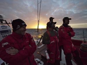 A light hearted sunset gathering on deck on CAMPER.